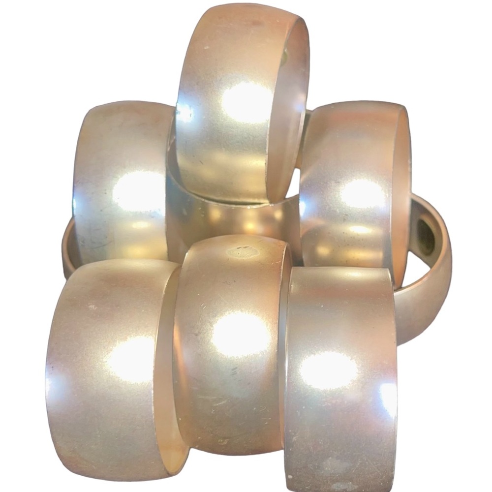 9 VTG silver napkin holder rings made in China.  Some tarnish.